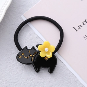Elastico per capelli a gatto nero con fiore giallo e perla su fascia elastica alta