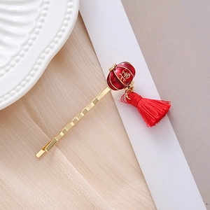Festive Chinese New Year hair clip with red lantern pendant, Fu character and silky tassel