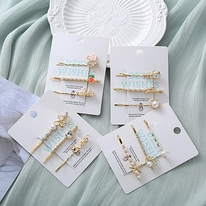 Élégant lot de 12 barrettes à cheveux lapin cœur avec perles et strass sur base dorée