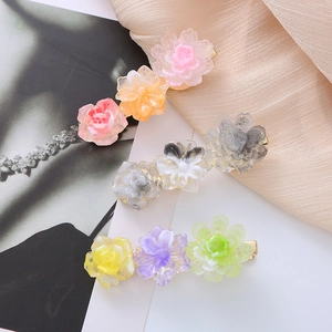 Floral acetate hair clips in sweet mixed colors on golden metal duckbill base