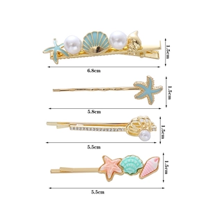 Detailed size specifications for starfish and shell hair clips with pearl accents