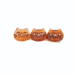 Simpatica molletta per capelli a gatto in acetato tartarugato ambra con tocchi dorati