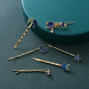 Set mollette cielo stellato con lune e pianeti in smalto blu e finitura dorata