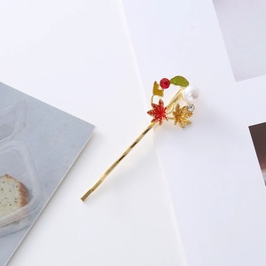 Golden maple leaf hair clip with glitter enamel autumn leaves and white pearl detail