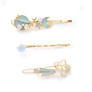 Set di tre fermagli per capelli dorati a tema stellare con resina blu e opale sintetico