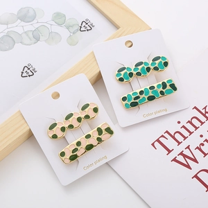 French vintage elegant duckbill hair clips with irregular polka dot patterns