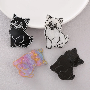 Cute cat shaped acrylic hair clips set in black, white, and marble purple finishes
