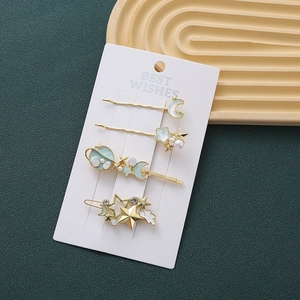 Haarklammer-Set mit Sternen und Mond aus blauer Emaille und Perlen auf vergoldeter Basis
