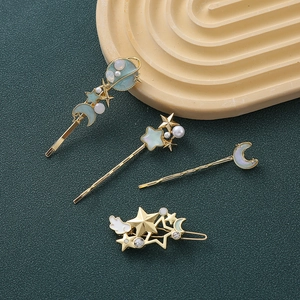 4-teiliges Sternenhimmel-Haarspangen-Set mit blauer Emaille und Kunstperlen