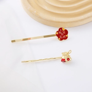 Barrettes chinoises du Nouvel An avec breloques porte-bonheur et design doré de sac de chance