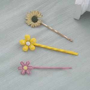 Set di tre graziose mollette per capelli floreali con margherite e disegni rosa