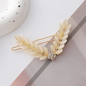 Barrette à cheveux feuilles dorées avec pierres œil de chat et fleur en cristal femme