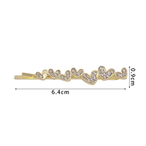 Detail view of heart-shaped rhinestone hair clip with dimensions 6.4cm by 0.9cm