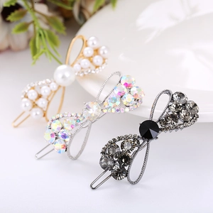 Elegant rhinestone bow hair clips in gold, silver, and charcoal grey finishes