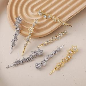 Sparkling rhinestone star and heart hair clips set in gold and silver finish