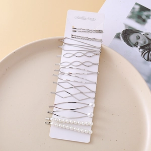 Lot de 15 barrettes à cheveux argentées avec perles sur carte de présentation mode