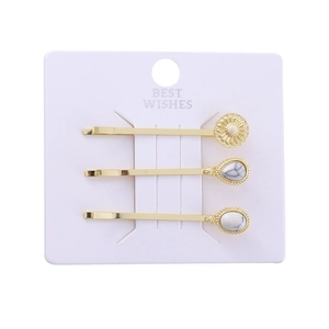 Three-piece gold hair clip set with turquoise floral and marble stone accents on card