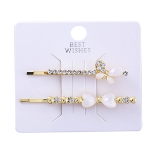 Golden butterfly and double heart hair clips with cat eye stones and sparkling rhinestones