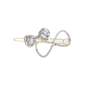 Elegant gold double bow hair clip with sparkling crystals and pearls on white background