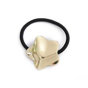 Minimalist elastic hair tie with a vintage golden star-shaped metallic ornament