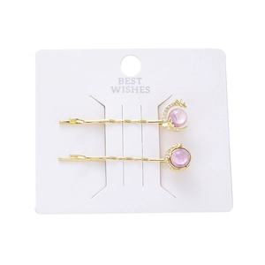 Elegant gold celestial hair clip set with purple cat eye stones and butterfly charms