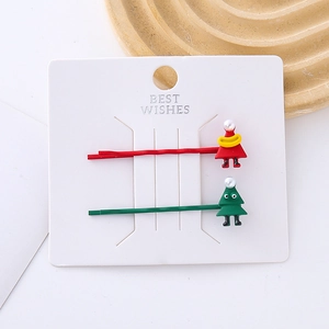Christmas hair clips set featuring cute Santa and green tree designs with white pearls