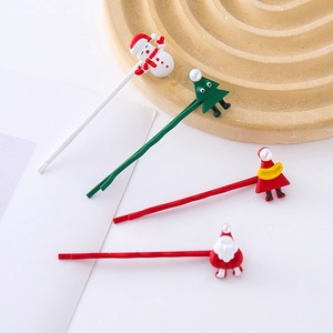 Cute Christmas hair clip set with snowman, tree and Santa Claus in festive colors