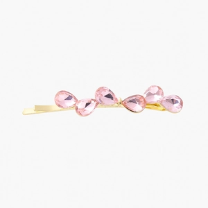 Goldener Haarclip mit rosa Zirkonia im Tropfenschliff in einem versetzten Design