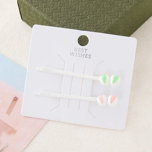 Minimalistisches Tulpen-Haarklammer-Set mit pastellfarbenen Harzperlen auf Karte