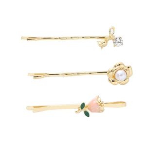 Set de 3 horquillas doradas con rosa, flor de perlas y diseños florales de cristal
