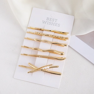 Lot de 6 barrettes à cheveux minimalistes dorées avec perles sur carte de présentation