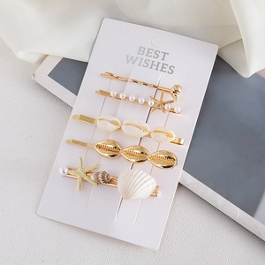Barrettes à cheveux thème océan avec étoile de mer dorée coquillage et perles