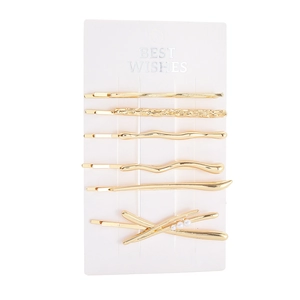 Détail d'un lot de 6 pinces à cheveux en métal doré avec perles sur carte support