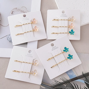 Lot de barrettes à fleurs roses et bleu sarcelle sur cartes avec accents dorés
