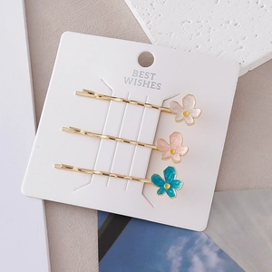 Lot de 3 barrettes à cheveux florales aux pétales colorés sur support doré chic