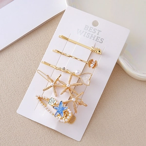 Lot de 5 pinces à cheveux dorées thème océan avec motifs étoile de mer, coquillage et sirène