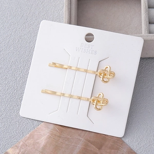 Set di eleganti fermagli per capelli dorati a quadrifoglio con finitura metallica