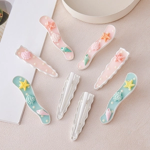 Ensemble de 7 barrettes à cheveux thème marin avec étoiles de mer et coquillages