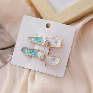 Lot de barrettes à cheveux thème océan avec étoiles de mer et résine marbrée