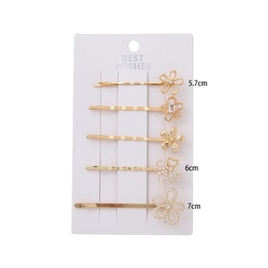 Five-piece set of gold flower hair clips with rhinestones and pearls on display card