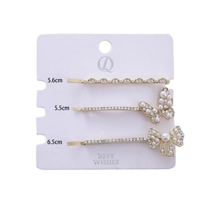 Three-piece rhinestone flower hair clip set with gold finish and white pearls