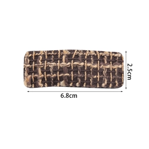 Detailed view showing the 6.8cm length and 2.5cm width of the houndstooth fabric hair clip