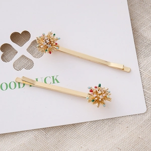 Set de barrettes dorées avec motifs de feux d artifice colorés et cristaux de zircone