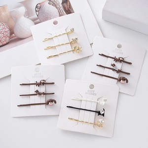 Three-piece cartoon animal hair clips set featuring cute dogs and cats with shiny crystals