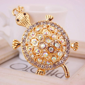 Porte-clés tortue en cristal étincelant avec strass colorés sur métal doré élégant