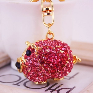 Porte-clés cochon en strass rose étincelant avec placage doré et fermoir homard