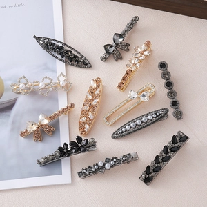 11-piece set of elegant heart and floral hair clips with pearls and dark rhinestones