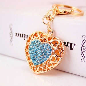Golden heart-shaped keychain with light blue rhinestones for women handbag charms