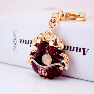Traditional Chinese style koi fish keychain with red enamel and gold finish lucky charm