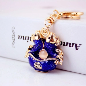 Chinese koi carp keychain with gold metal frame, blue enamel fish and Fu character charm